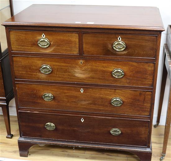 A George III mahogany chest of five drawers	